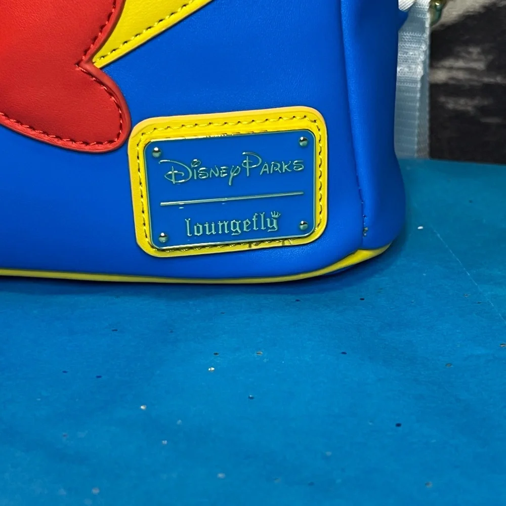 RARE Disney Parks Loungefly Backpack - Donald Duck UV Reactive 90th Anniversary - Picture 2 of 3